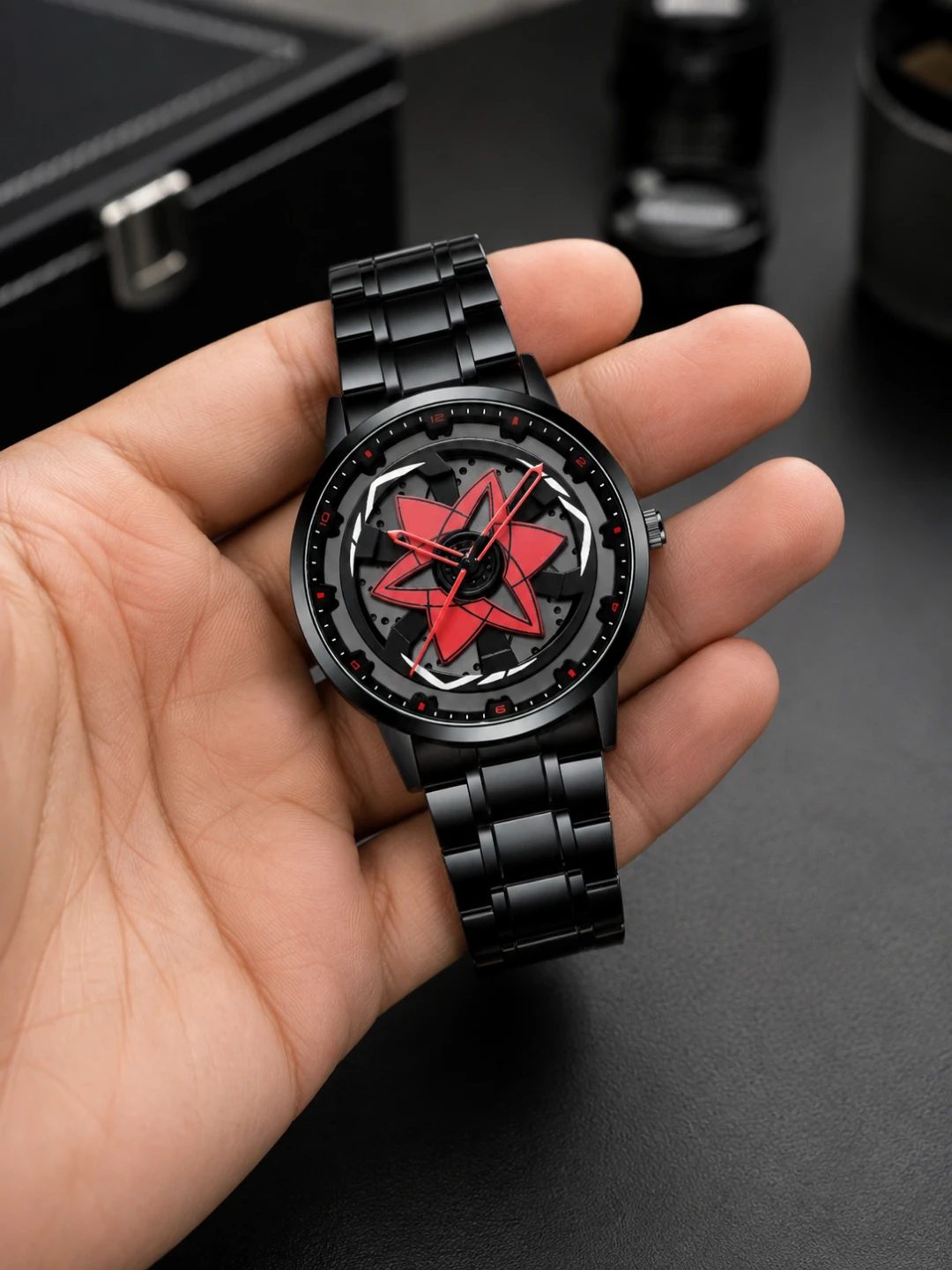Black Metal Watch with Red Starburst Dial spinning watch