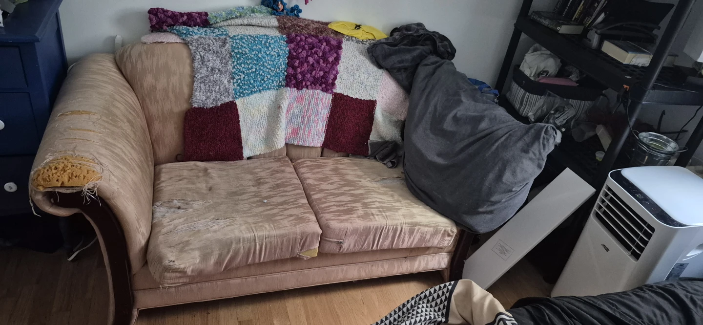 Beaten up Loveseat