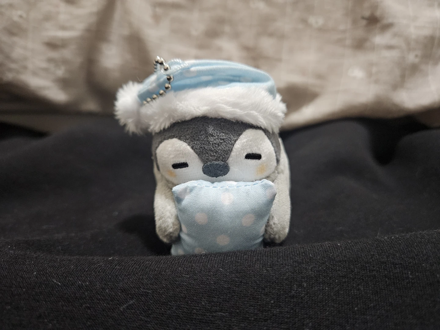 Sleepy penguin keychain