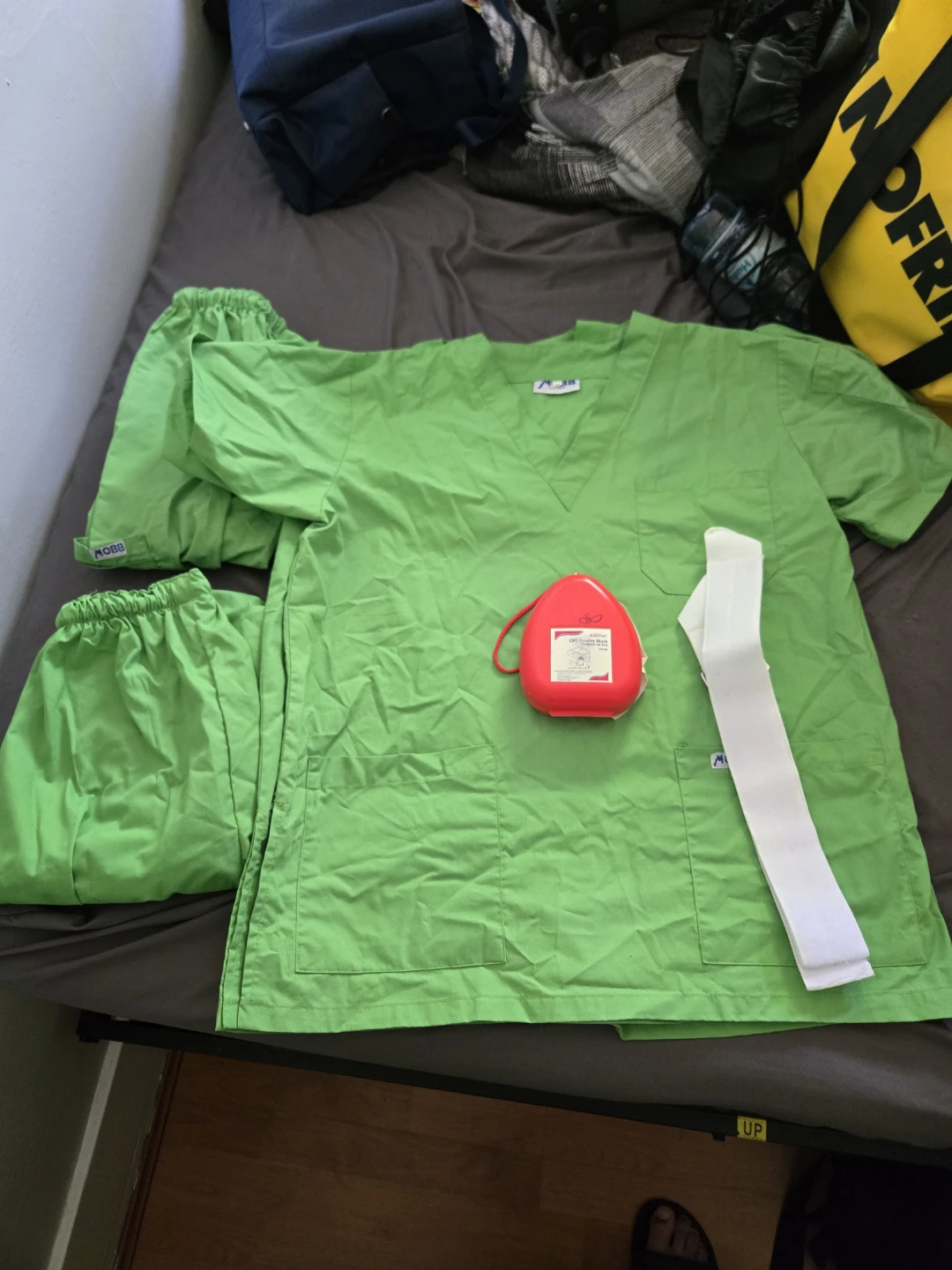HCA Green Scrub Set with Red CPR Mask