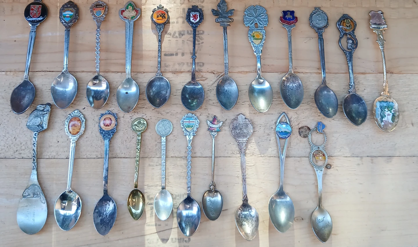 Collection of 23 souvenir spoons