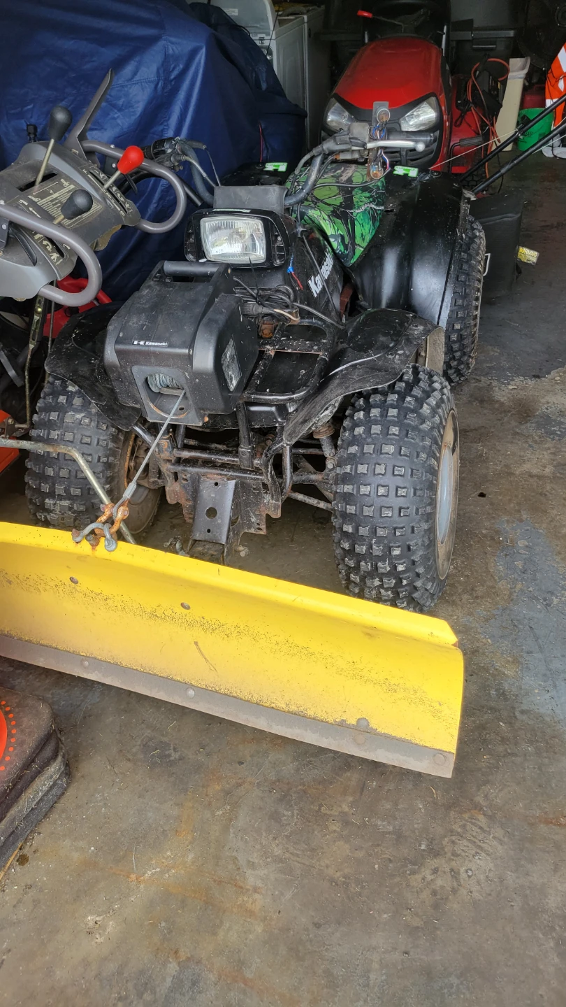 Kawasaki ATV with Plow