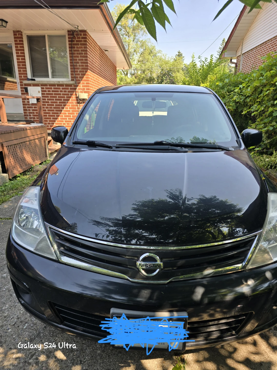 Black Nissan Versa Hatchback - photo 2