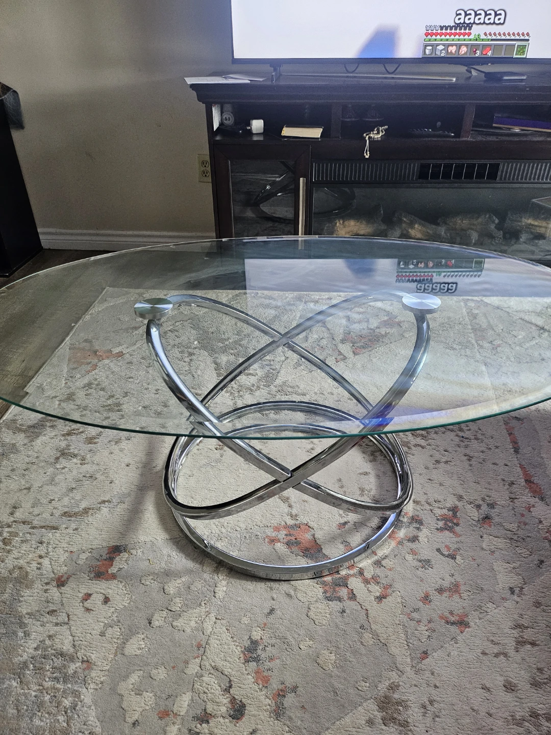Glass and Chrome Oval Coffee Table