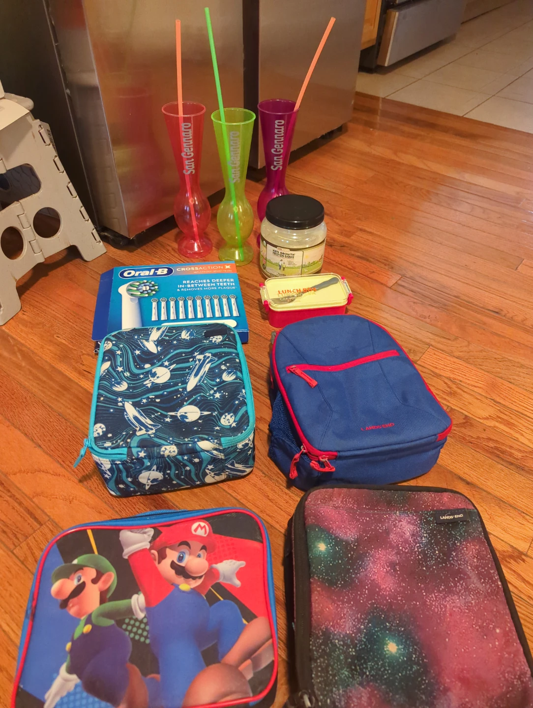 Assorted Lunch Boxes, Cups, and Oral-B Toothbrushes - photo 2