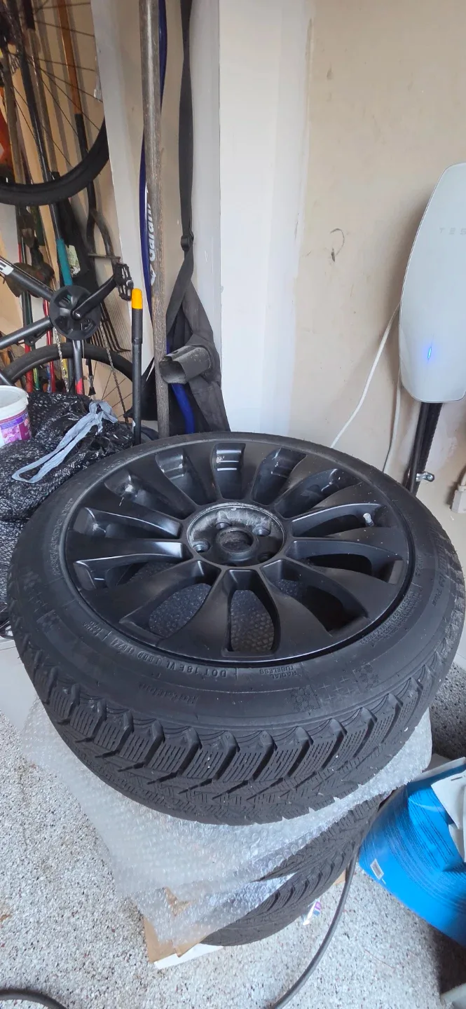 Nexen Winguard Ice Plus Tires on rims - 235/45R18 98T