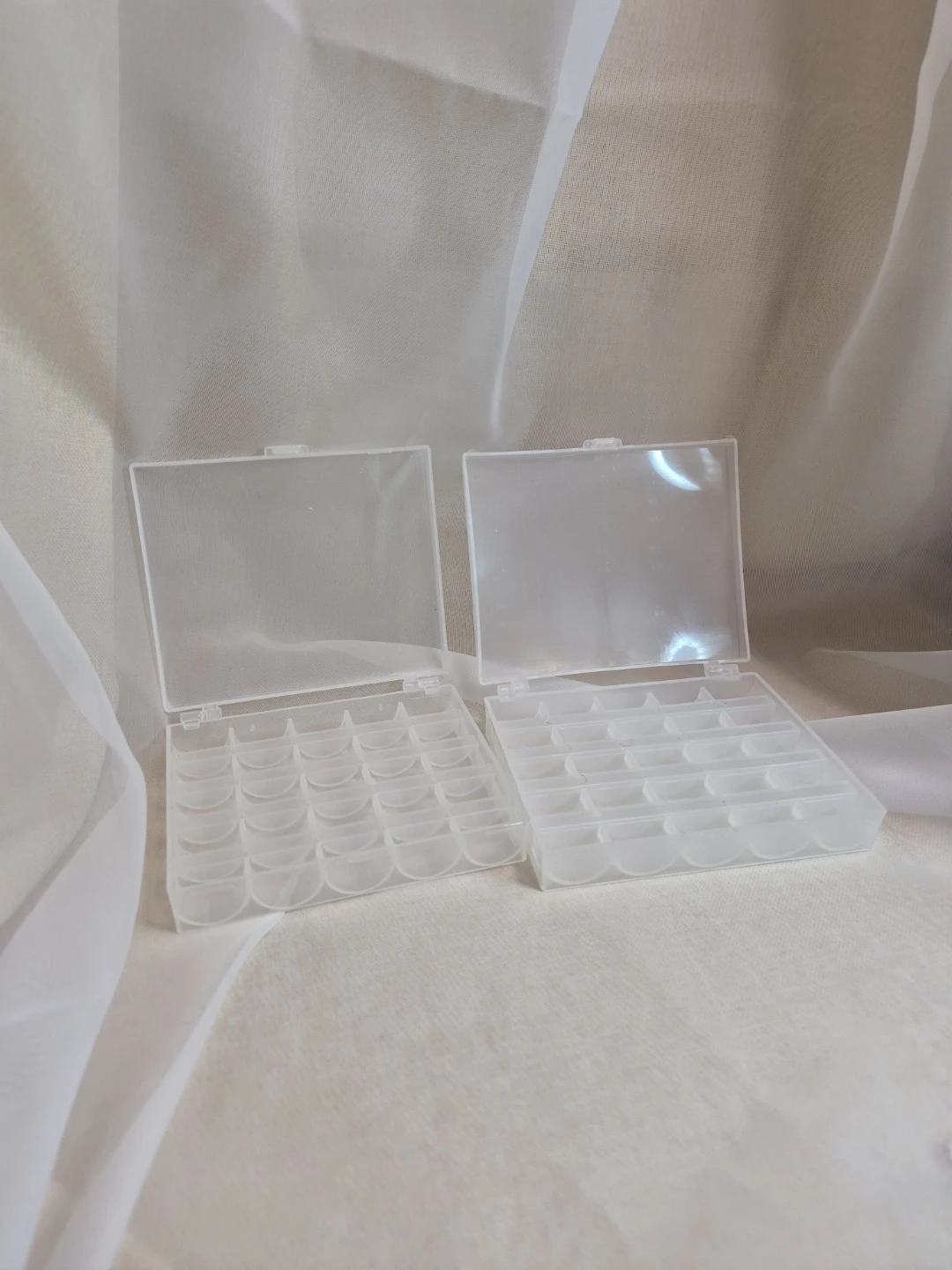 2 Plastic Bobbin Holder Containers each hold 25