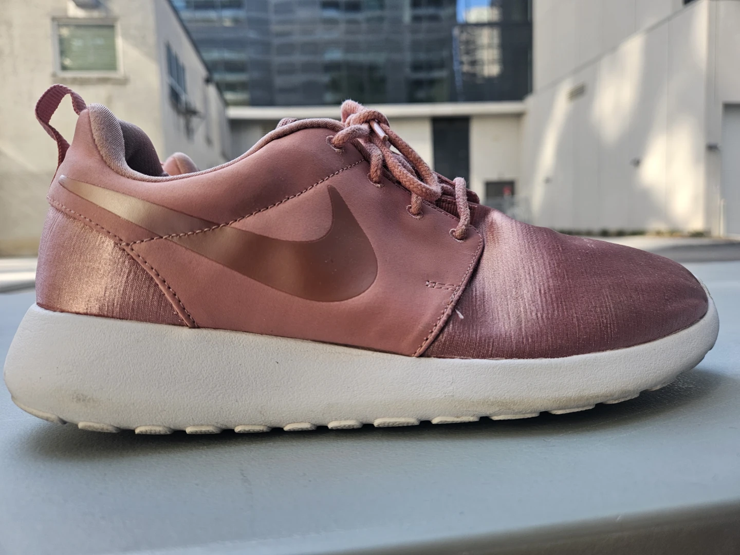 Women's size 7 Nike Roshe Run Rose Gold Sneakers