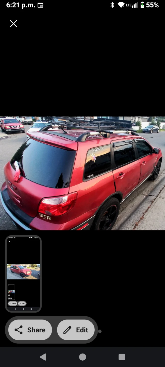 Red Mitsubishi Outlander