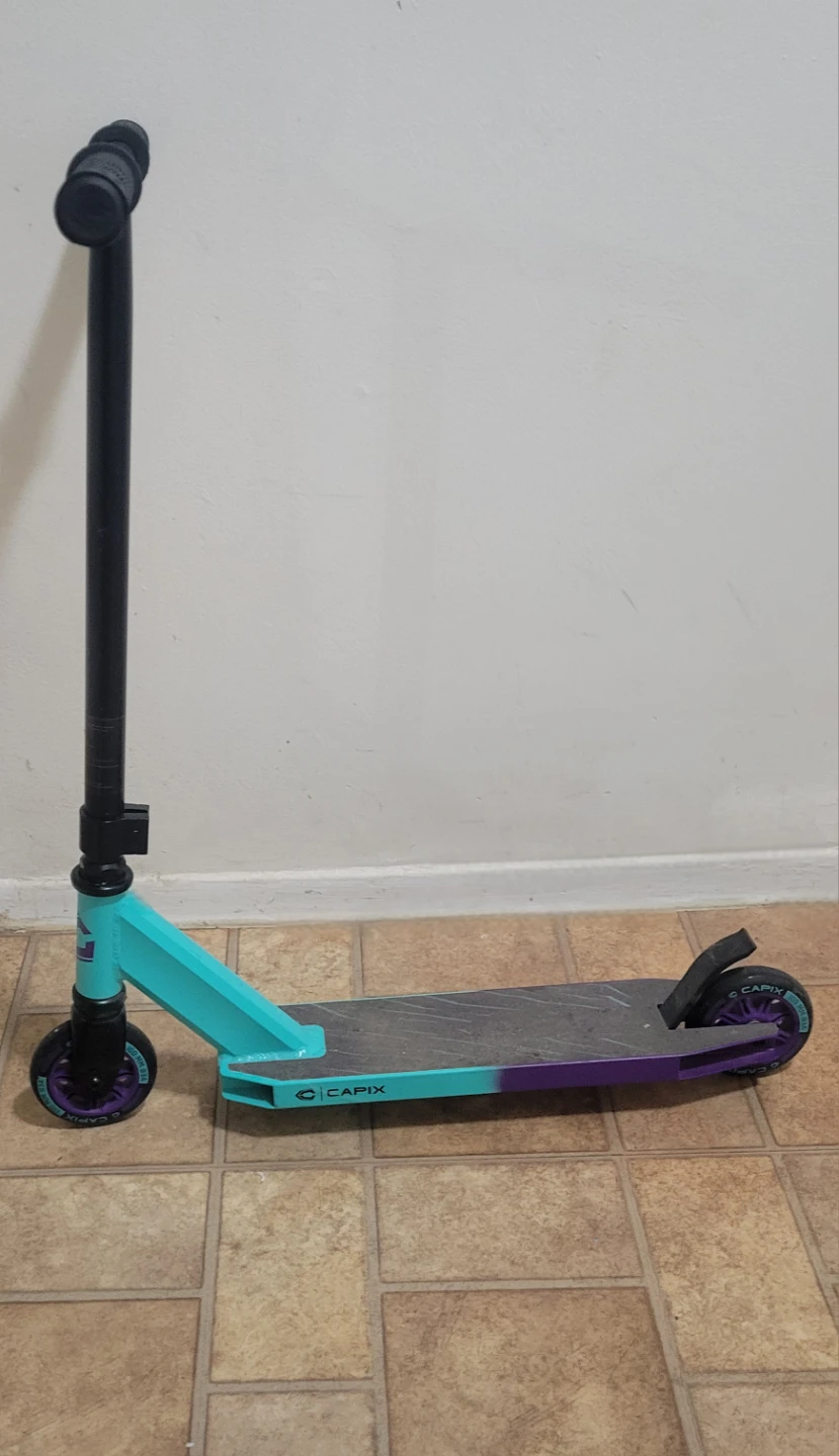 Teal and Purple Stunt Scooter