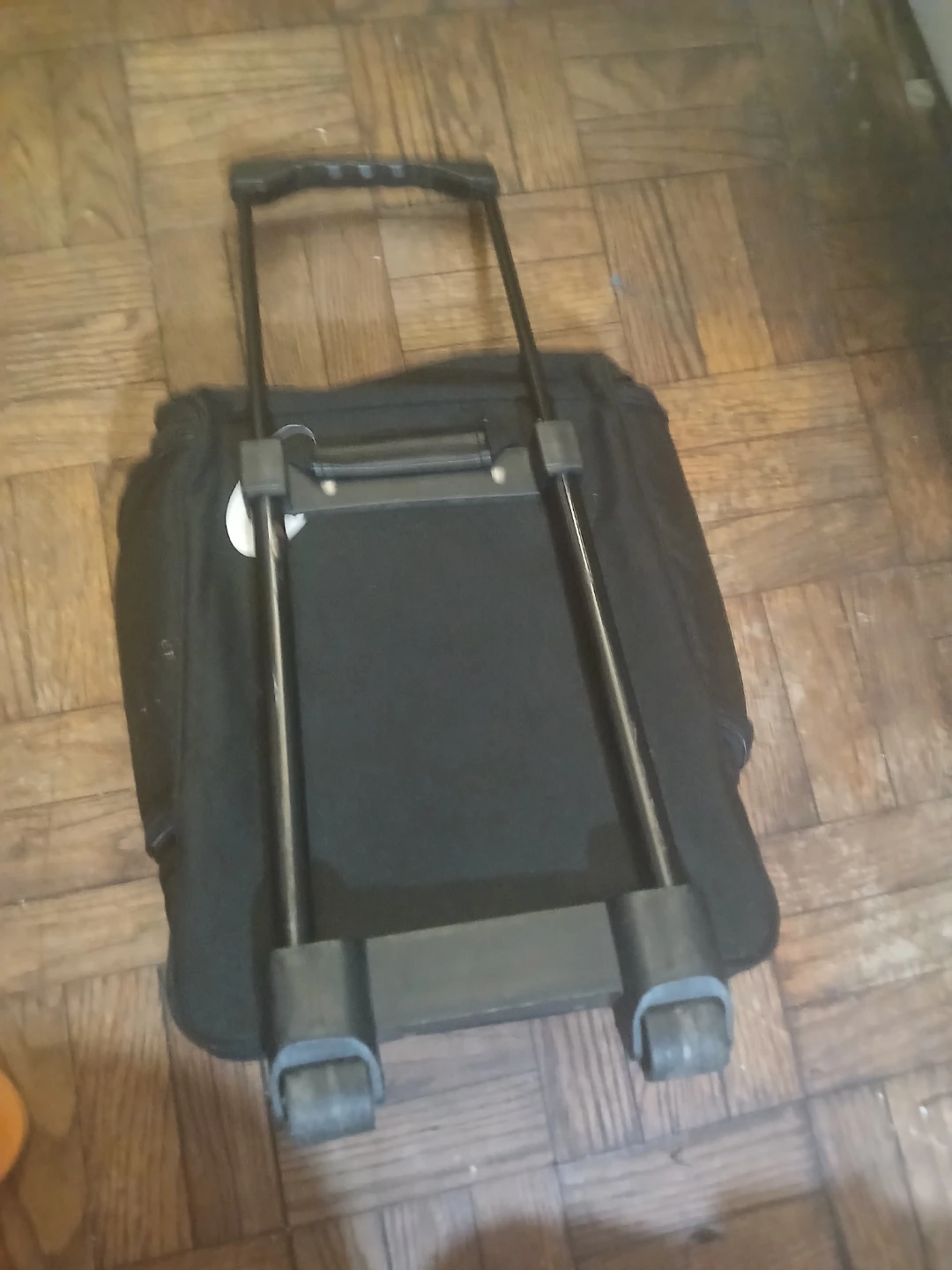 Black Rolling Carry-On Travel Bag - photo 2