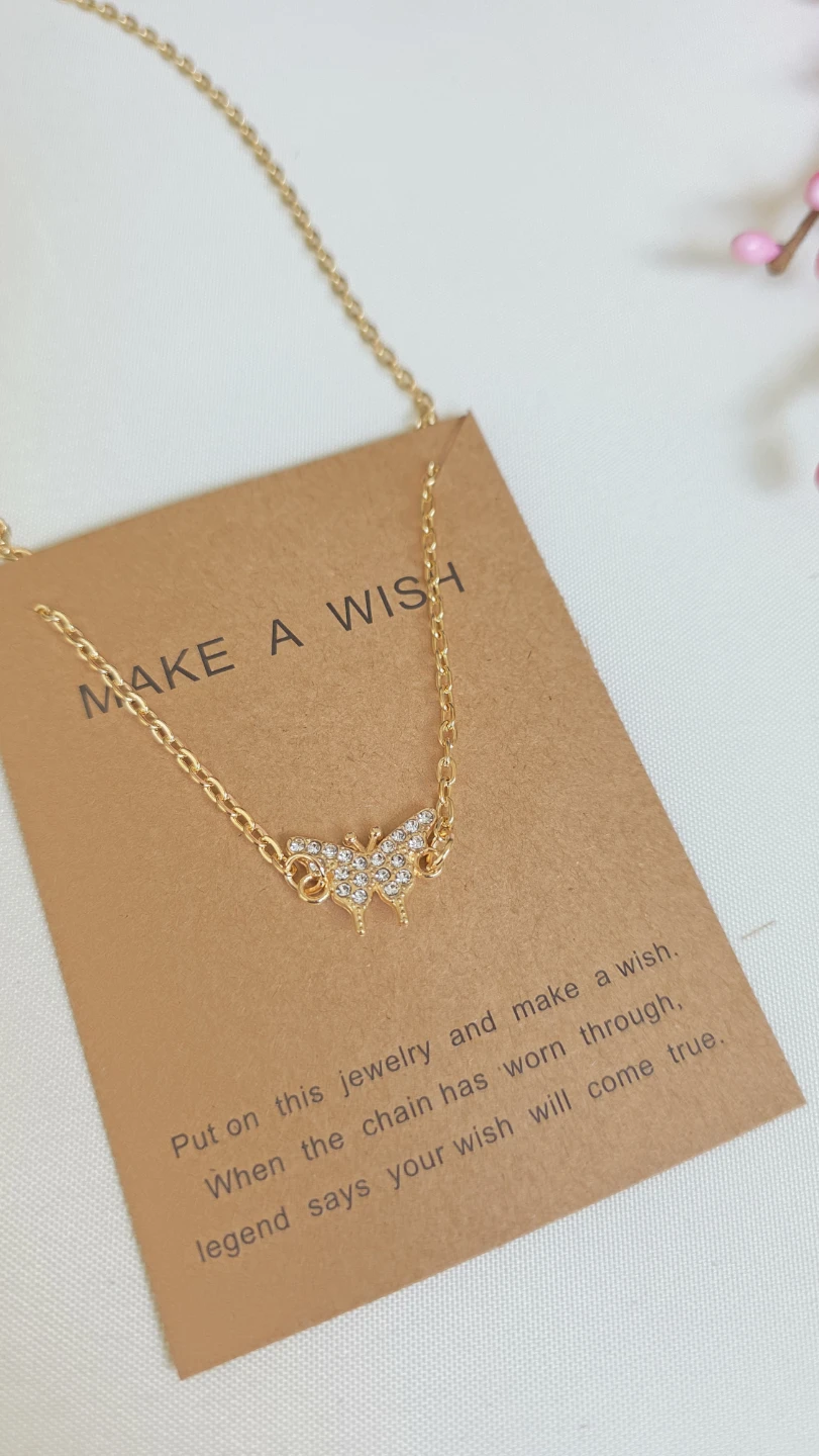 Gold butterfly necklace with "Make a Wish" card