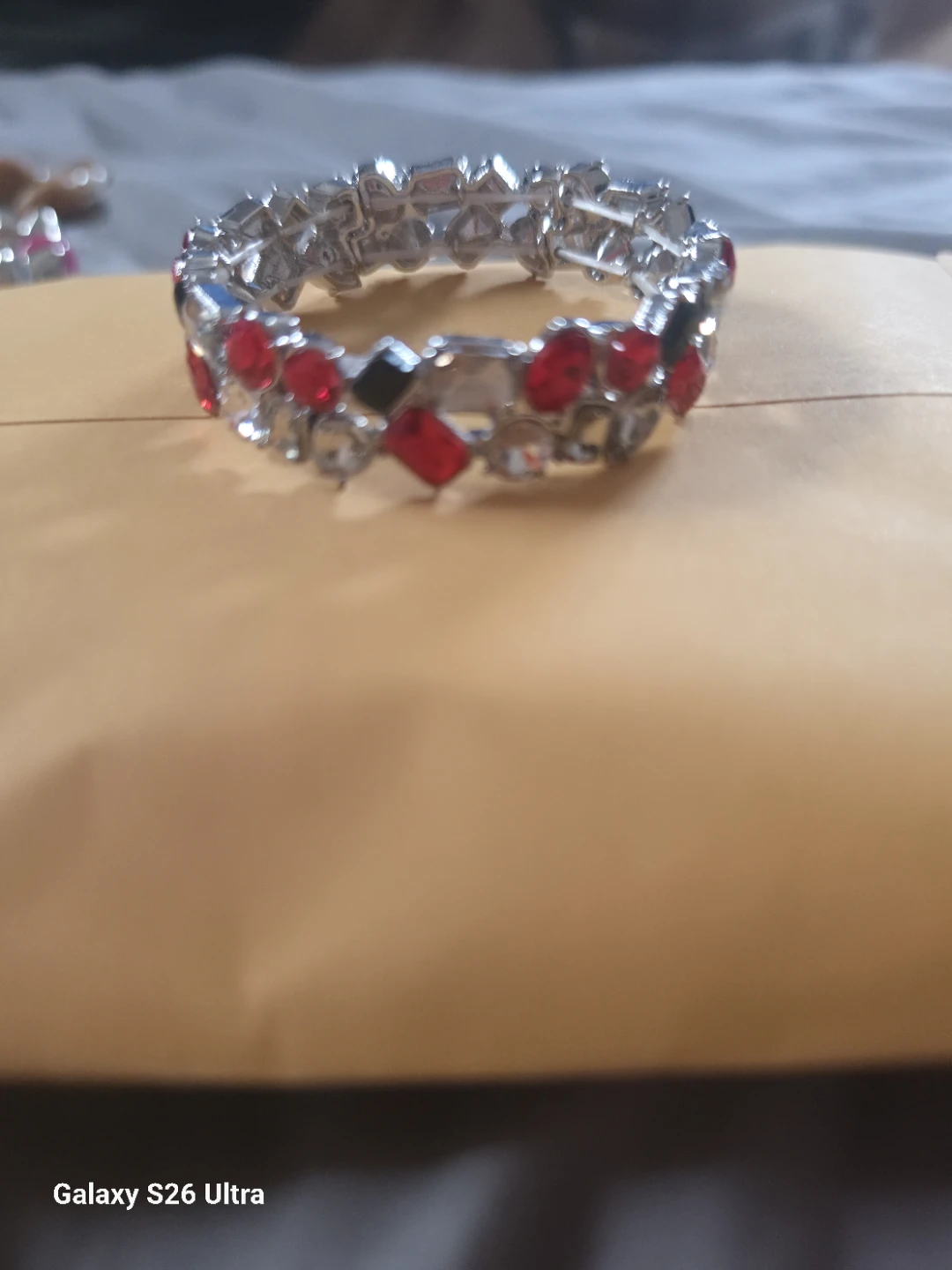 Silver Tone Stretch Bracelet with Red and Clear Stones