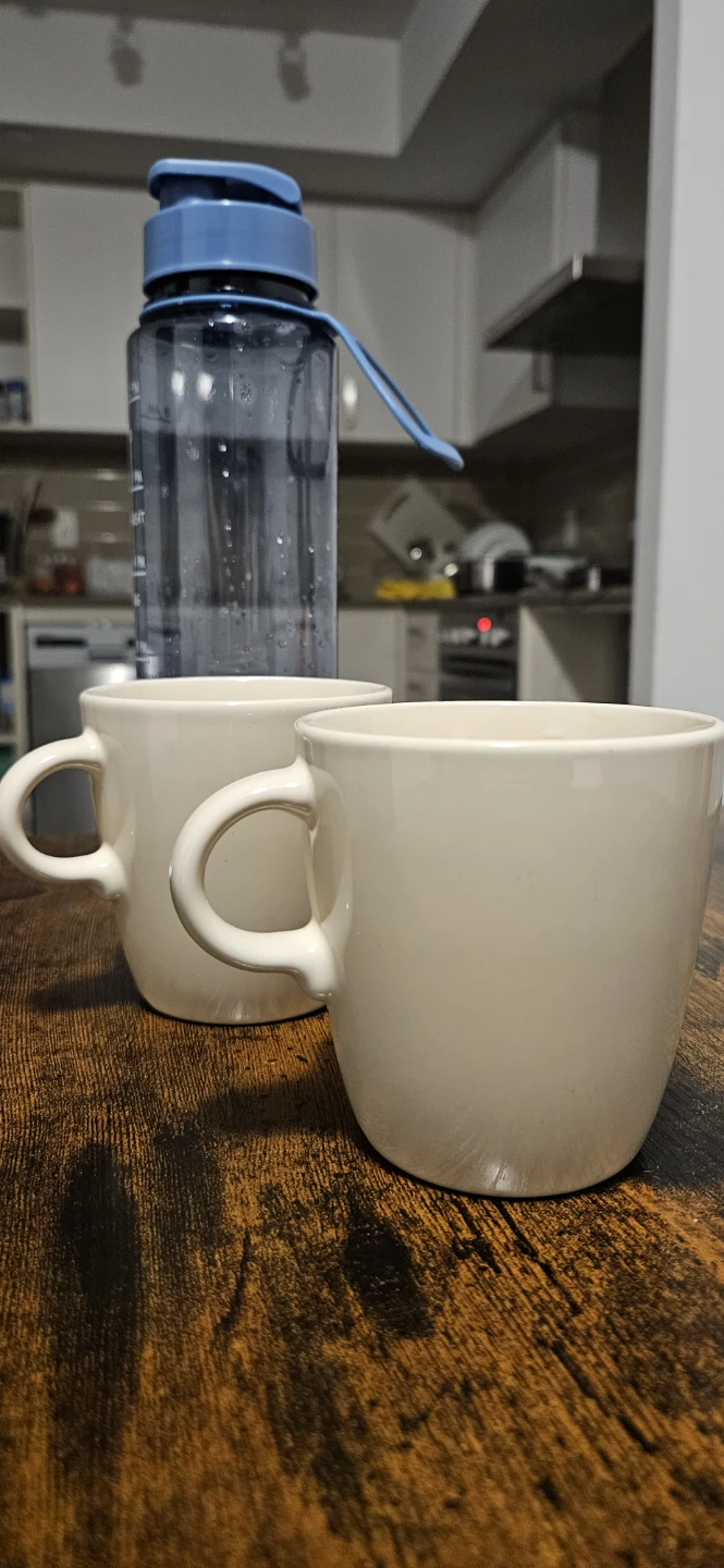 All in this price :Set of 2 Ceramic Mugs and Blue Water Bottle