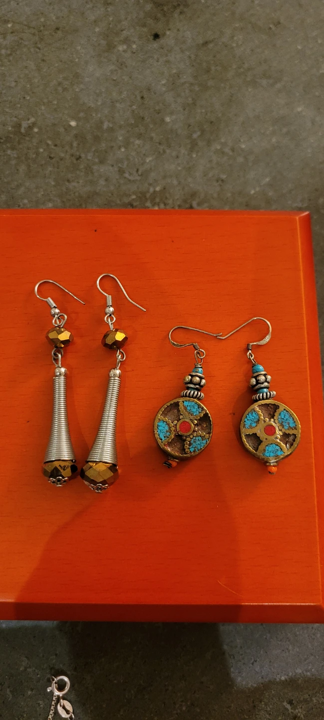 Tibetan-style earrings with turquoise and red accents
