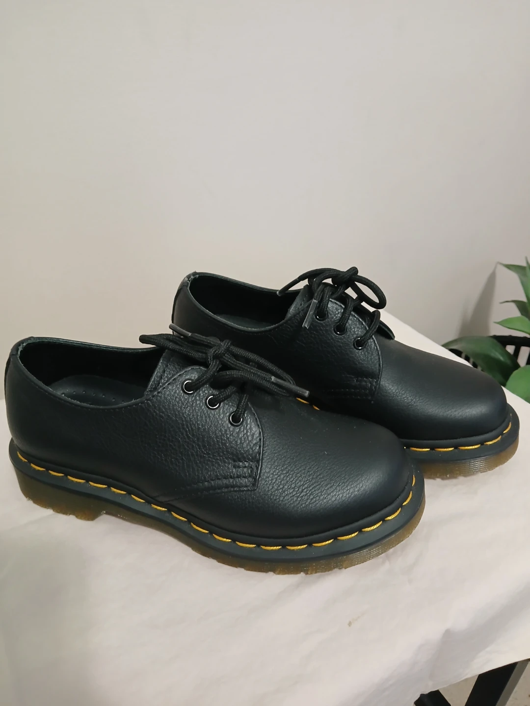 Dr. Martens and ankle cowboy boots.
