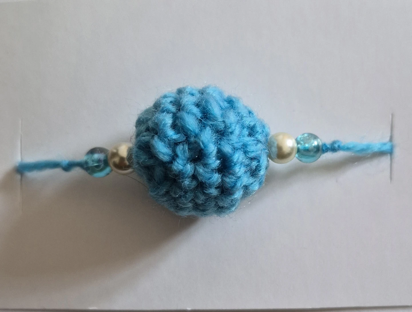 Handmade Crocheted Blue Beaded Rakhi