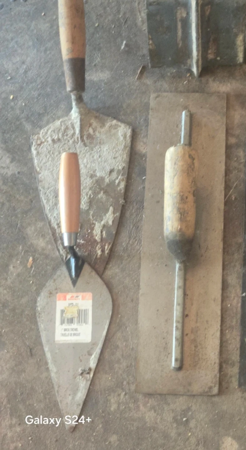 Assorted Trowels and Masonry Tools