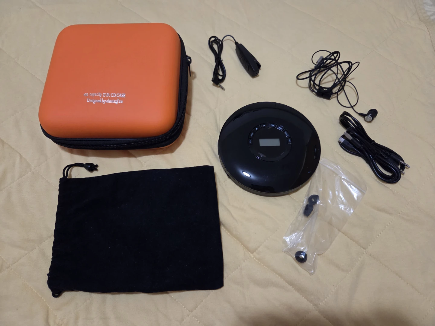 Portable CD Player with Accessories and Storage Case