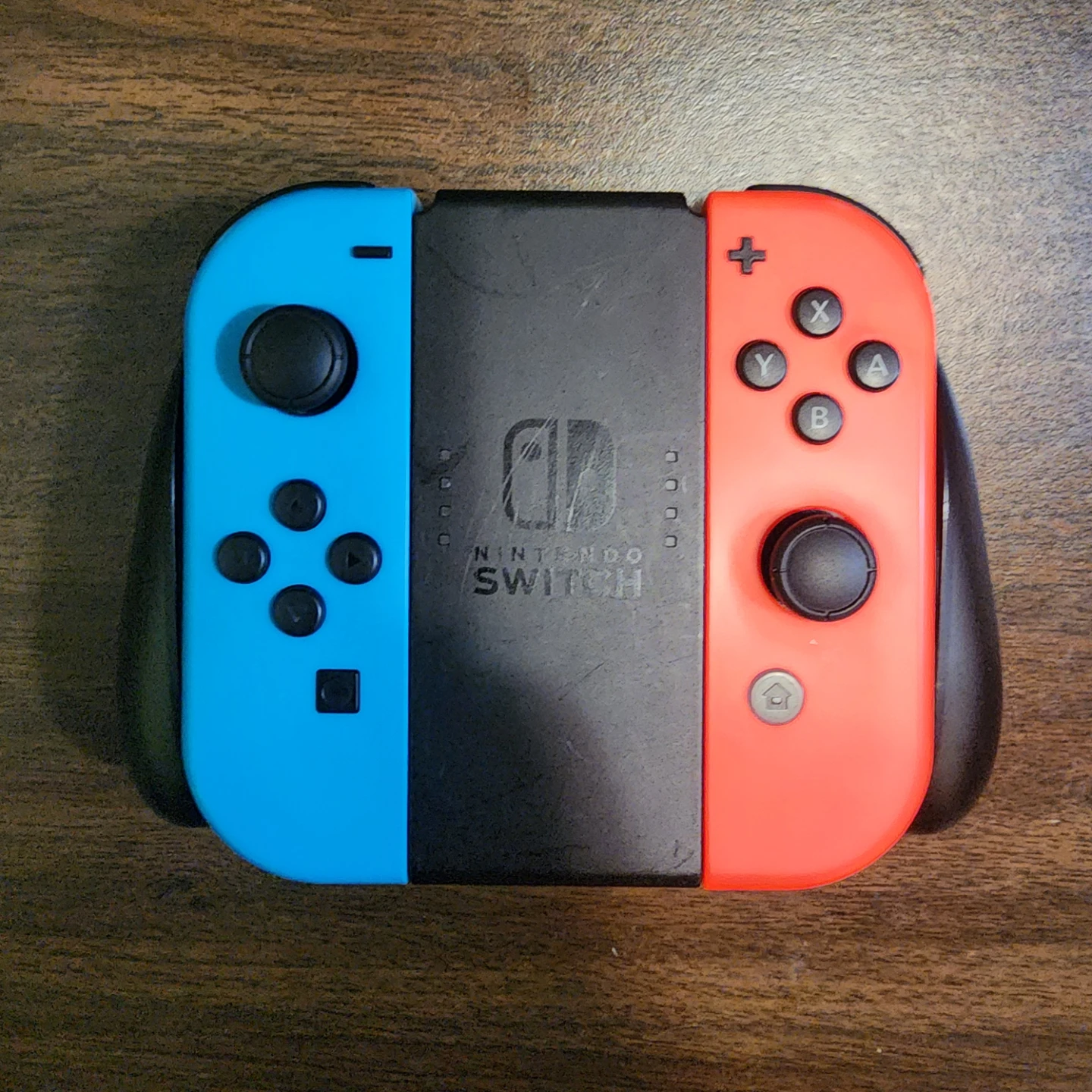 Joy cons with charger grip and connection cable. - photo 3