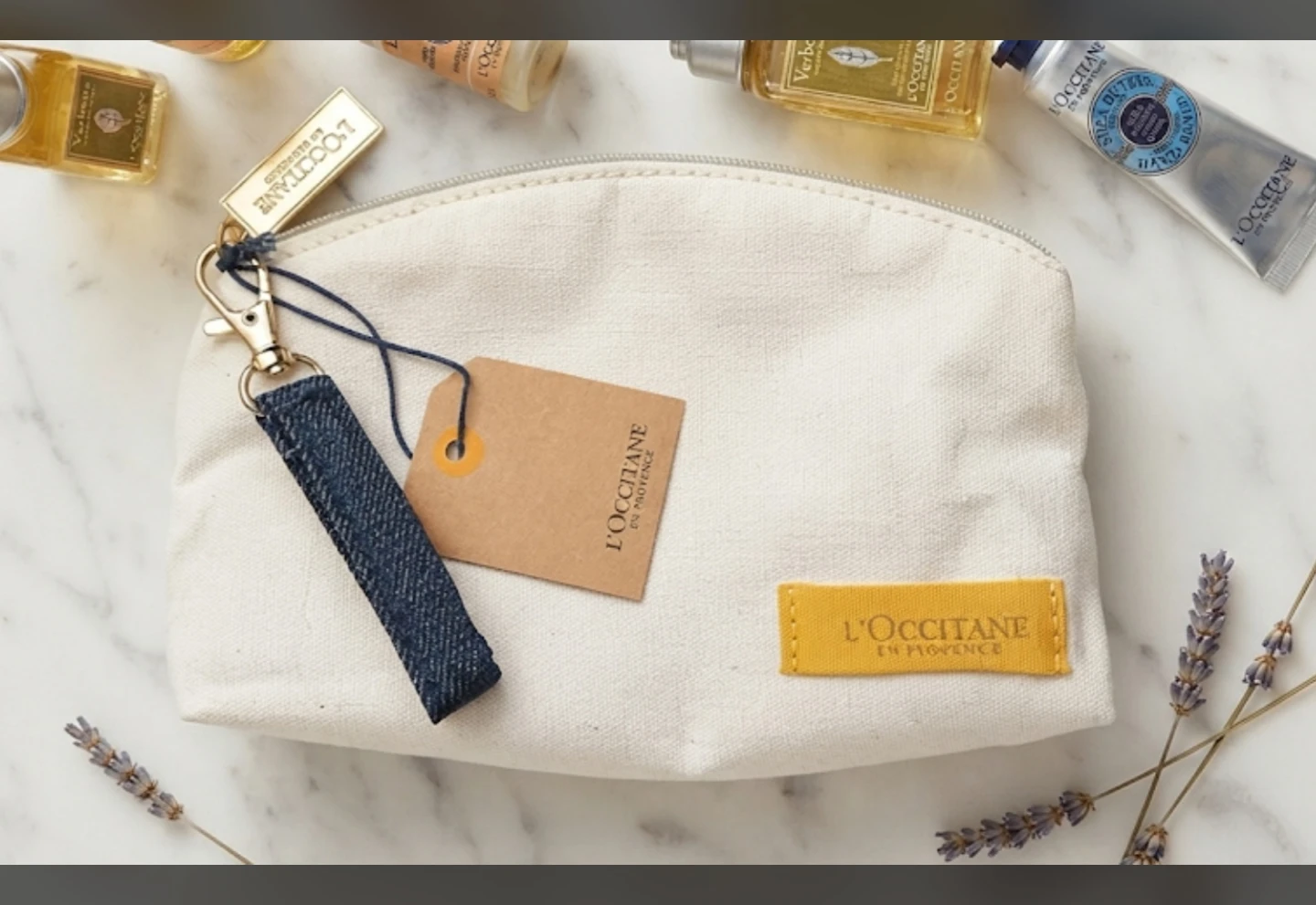 BN loccitane cotton pouch  + shower oil mini - photo 2