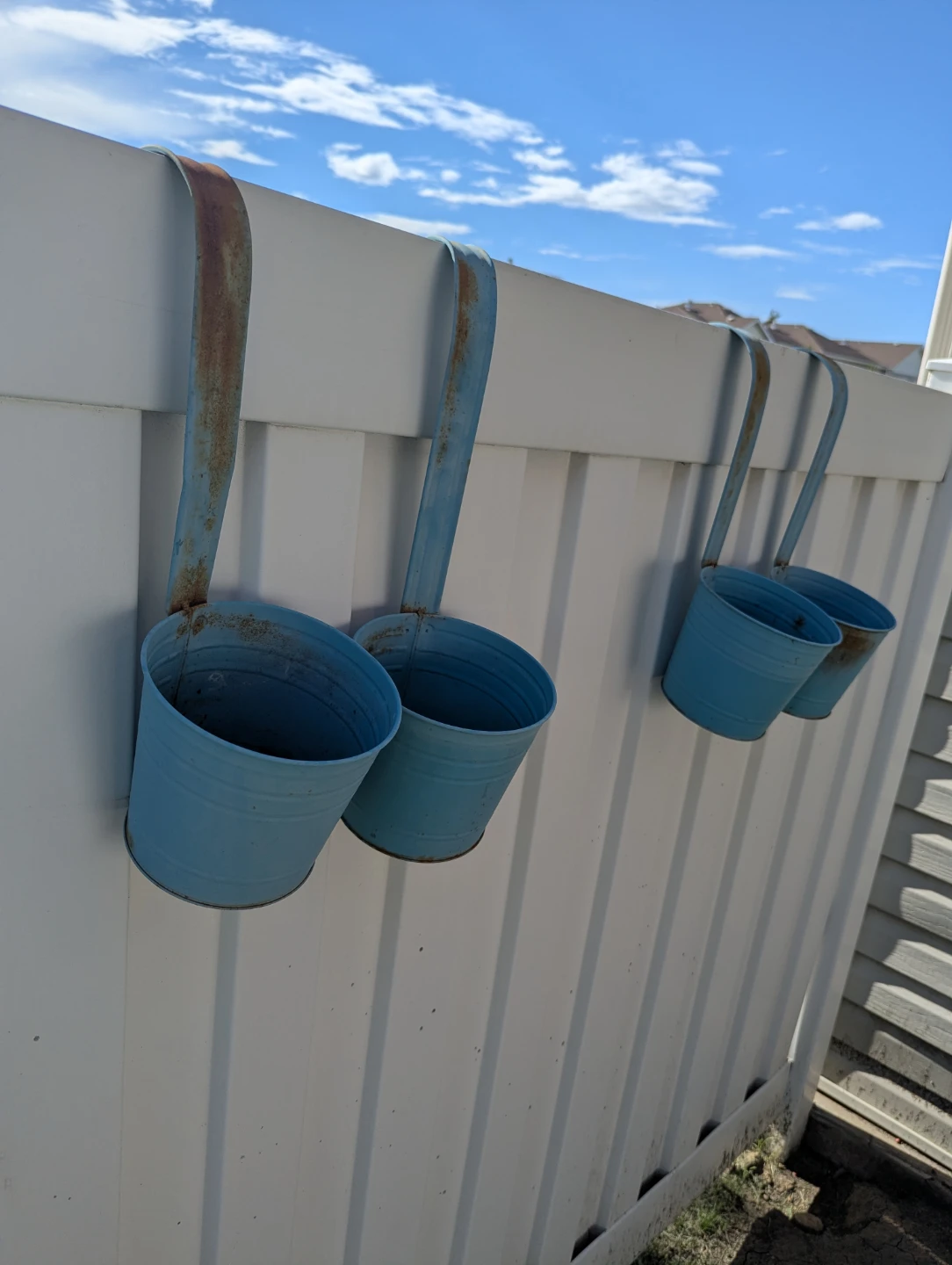 4 rusted metal plant hangers $5 FOR ALL will need painting