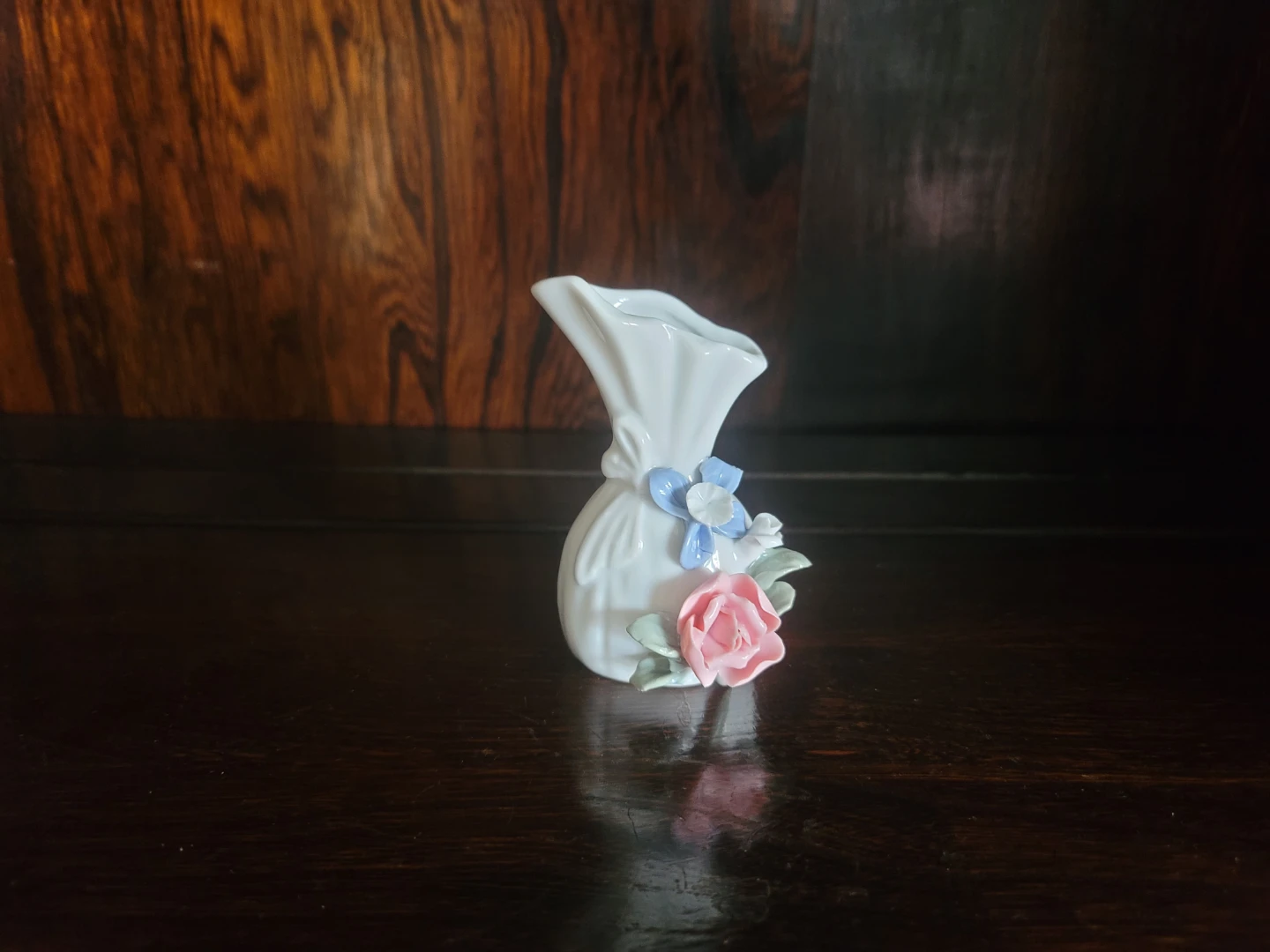 Small White Ceramic Vase with Flowers