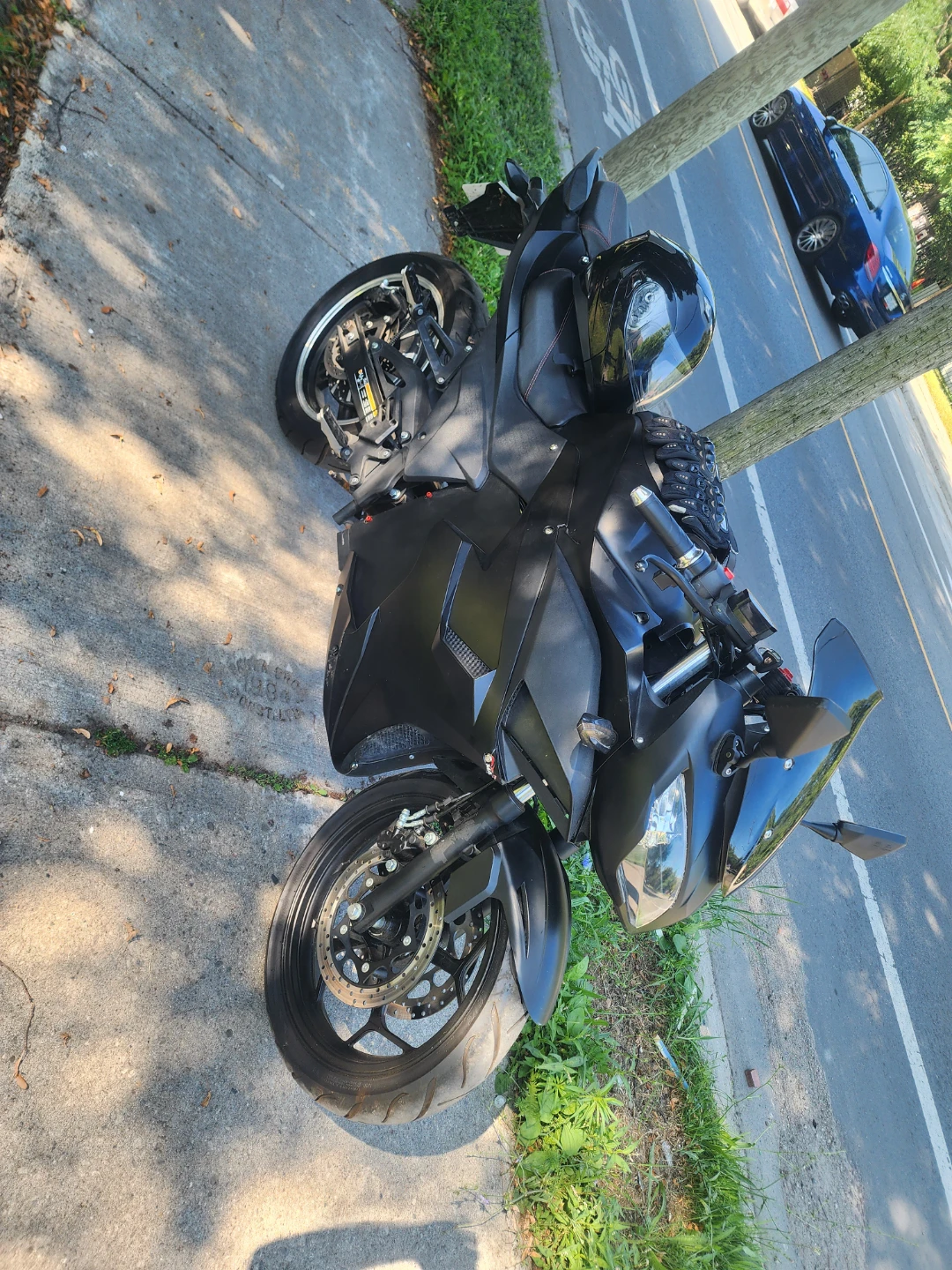 Black Electric Motorcycle with Helmet