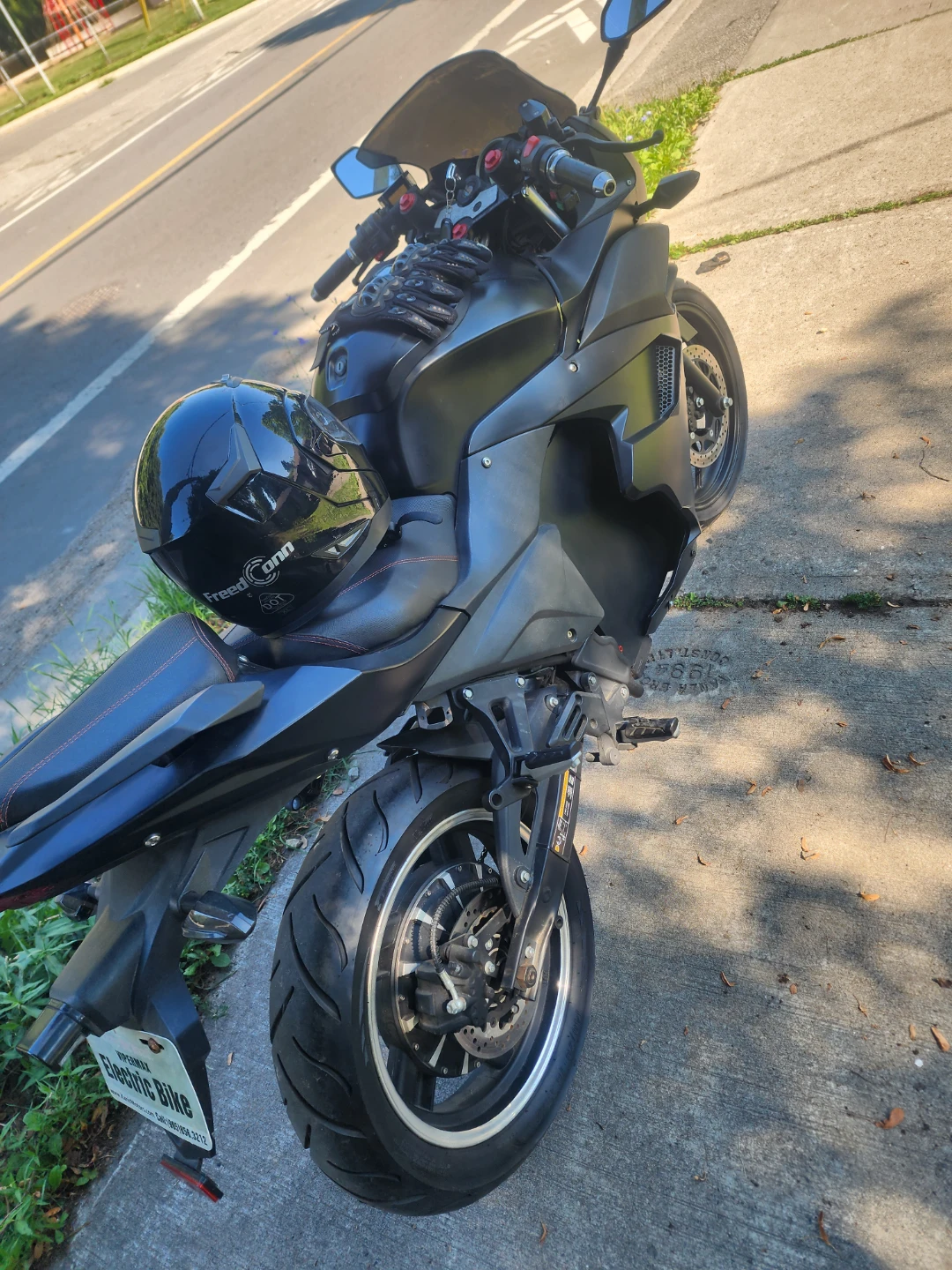 Black Electric Motorcycle with Helmet - photo 4