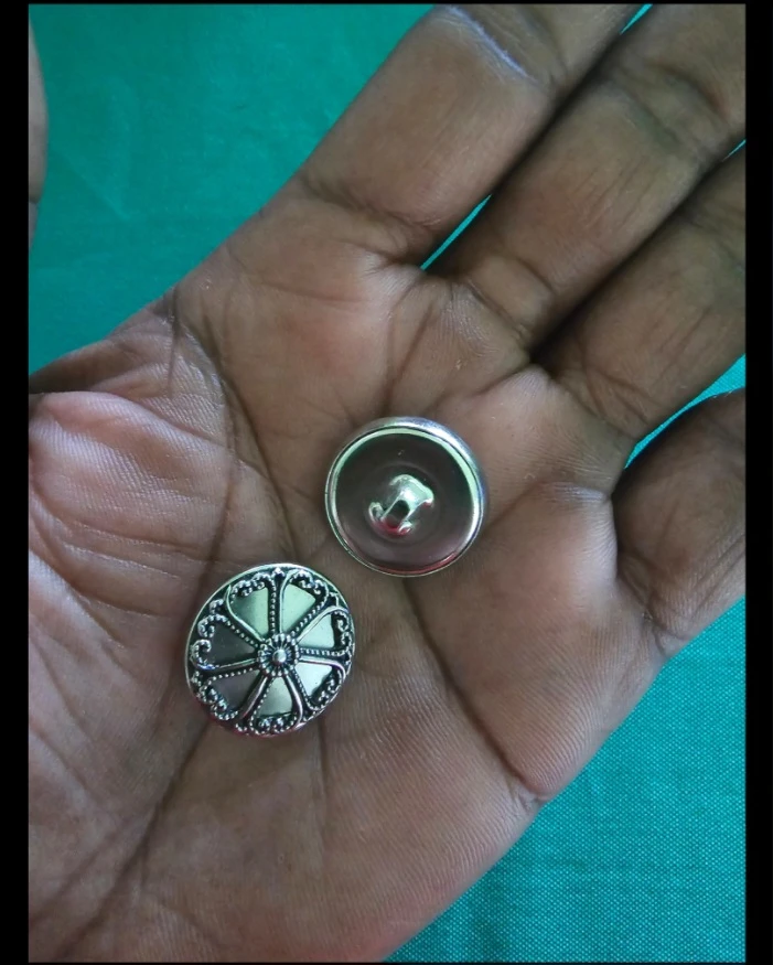 Ornate Silver-Tone Decorative Buttons