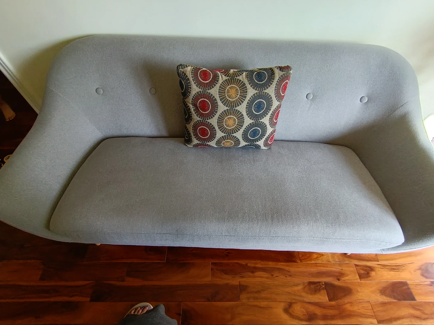 Grey Sofa with Accent Pillow