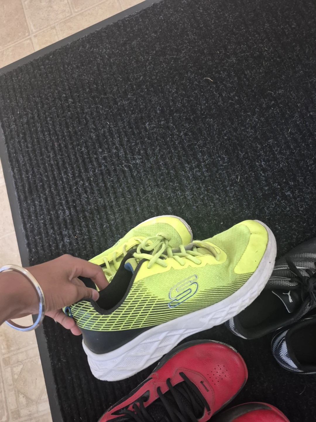 3 pair of shoes one is soccer 2nd is bassketball 3rd is running
