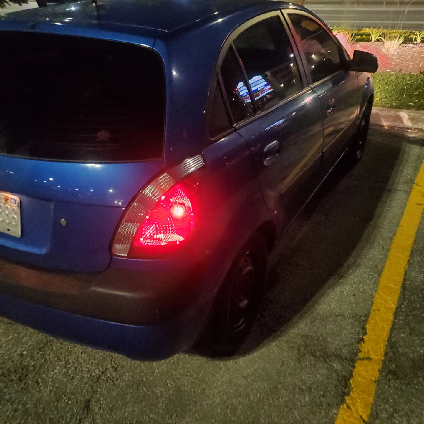 Blue Kia Rio Hatchback - photo 4