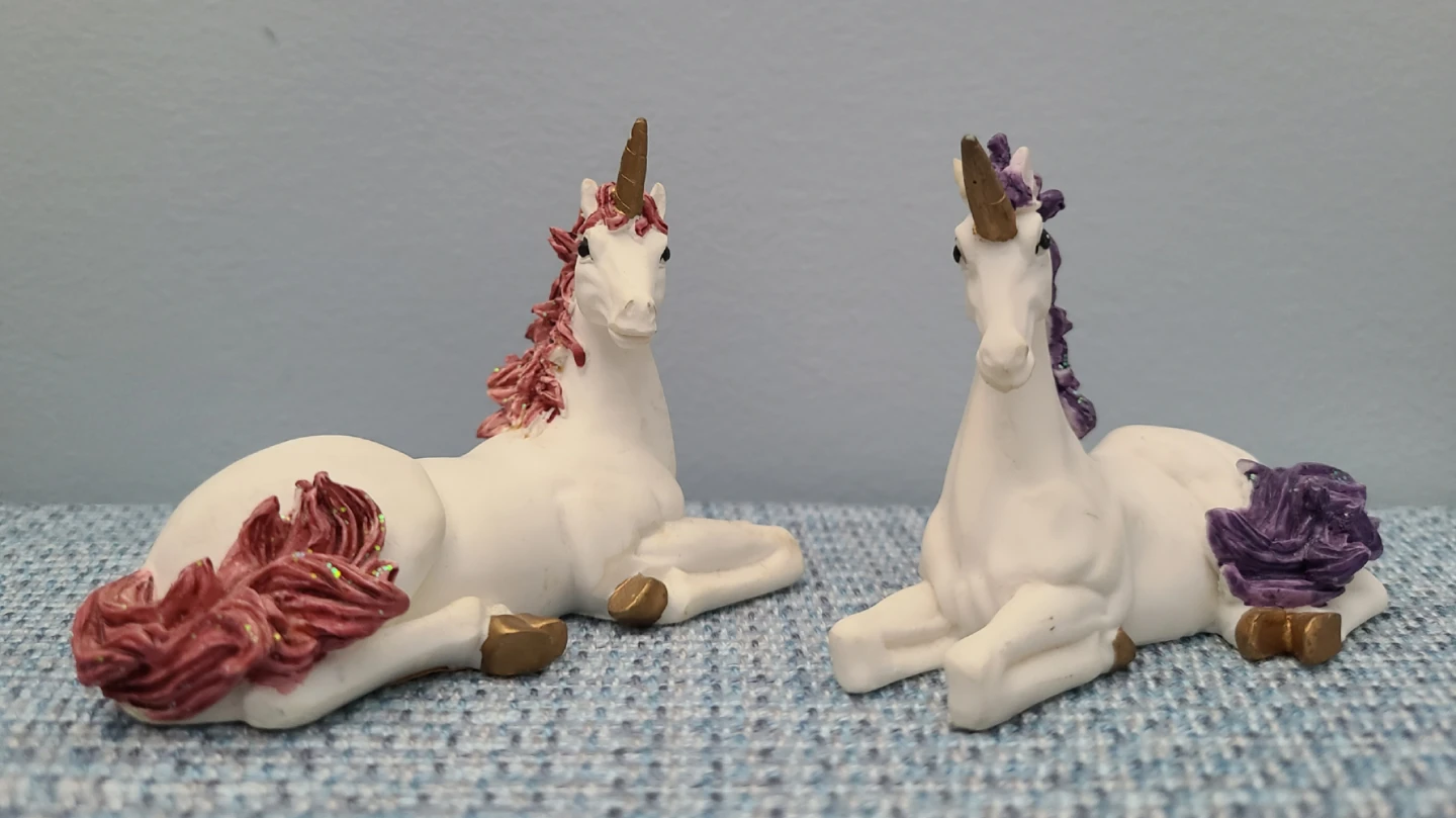Two Unicorn Figurines