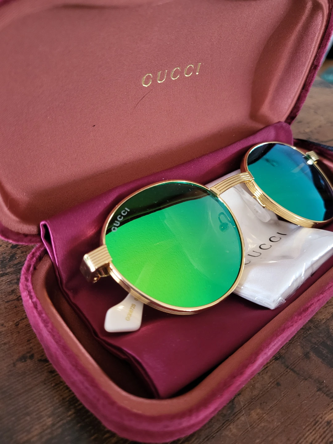 Gucci Sunglasses with Green Lenses