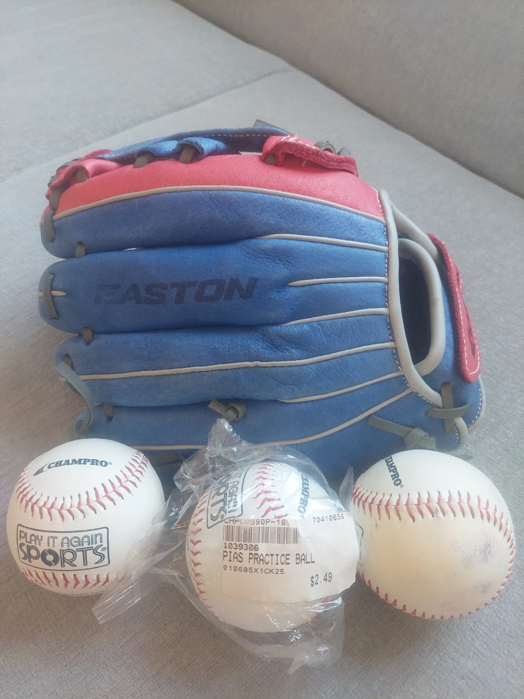11" Easton Baseball Glove plus 3 balls.
