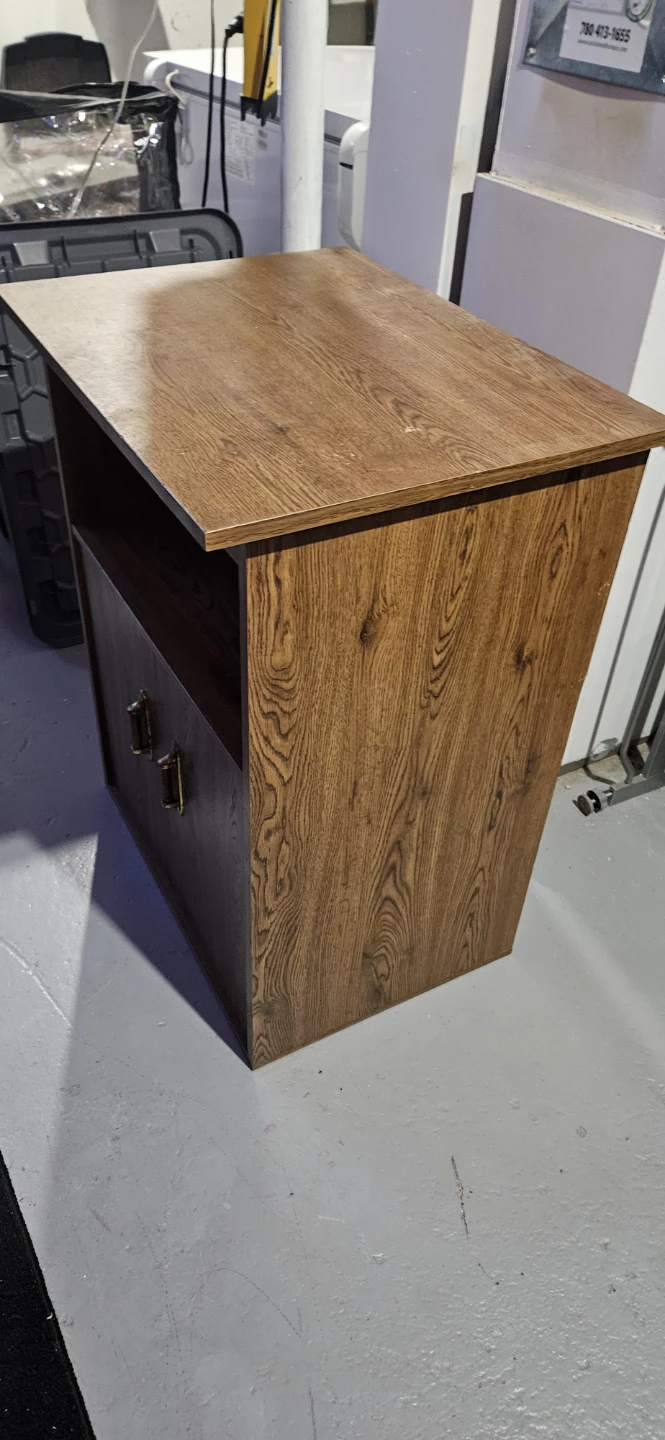 Small wooden cabinet with doors and shelf