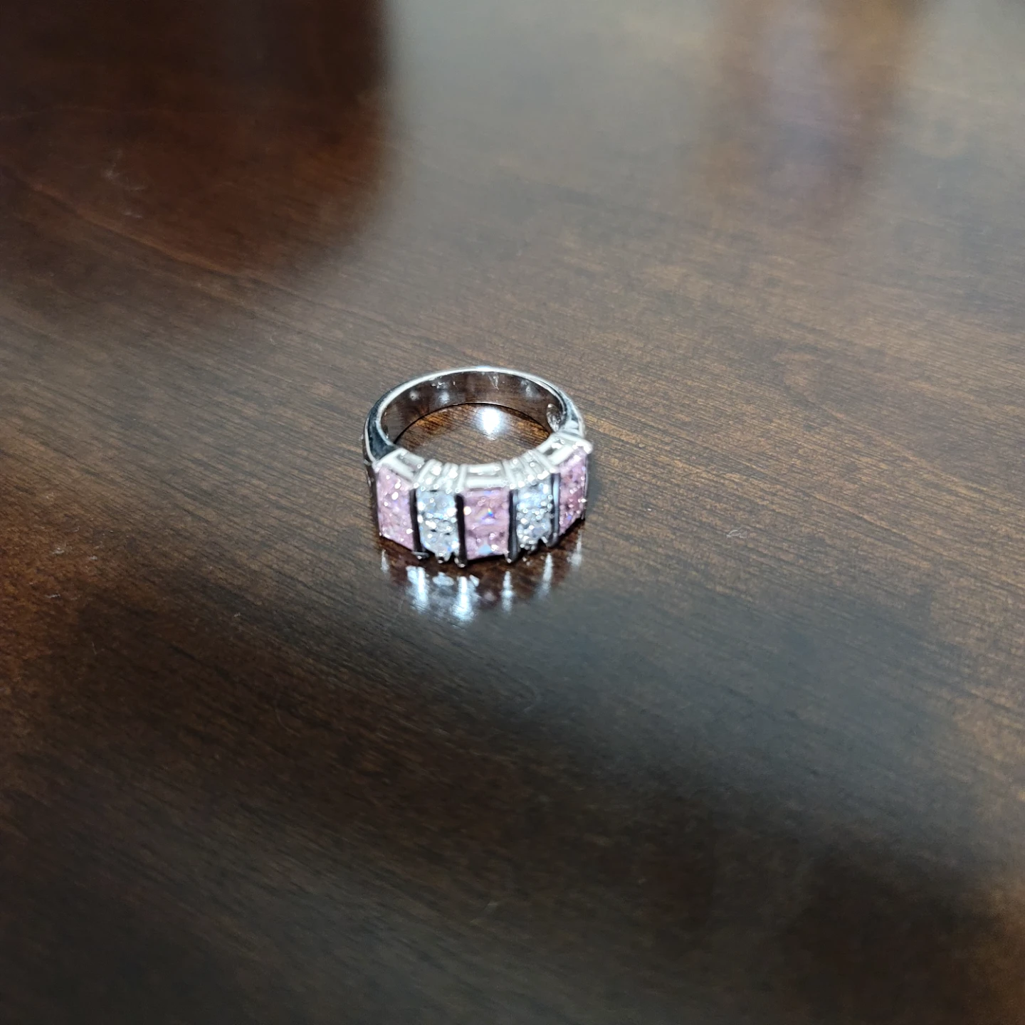 Silver-tone ring with pink and clear stones