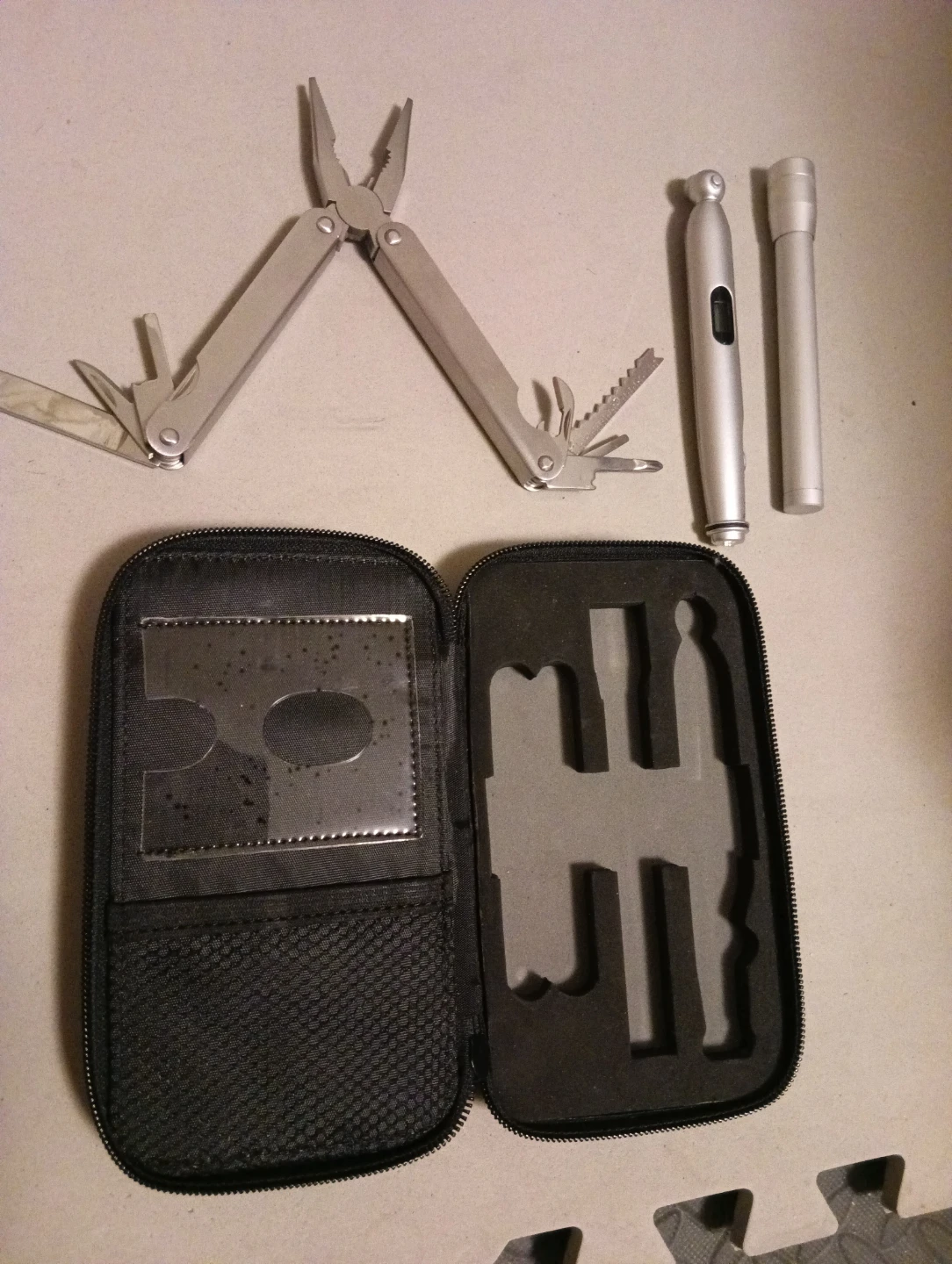 Multi-tool with flashlight and repair pen