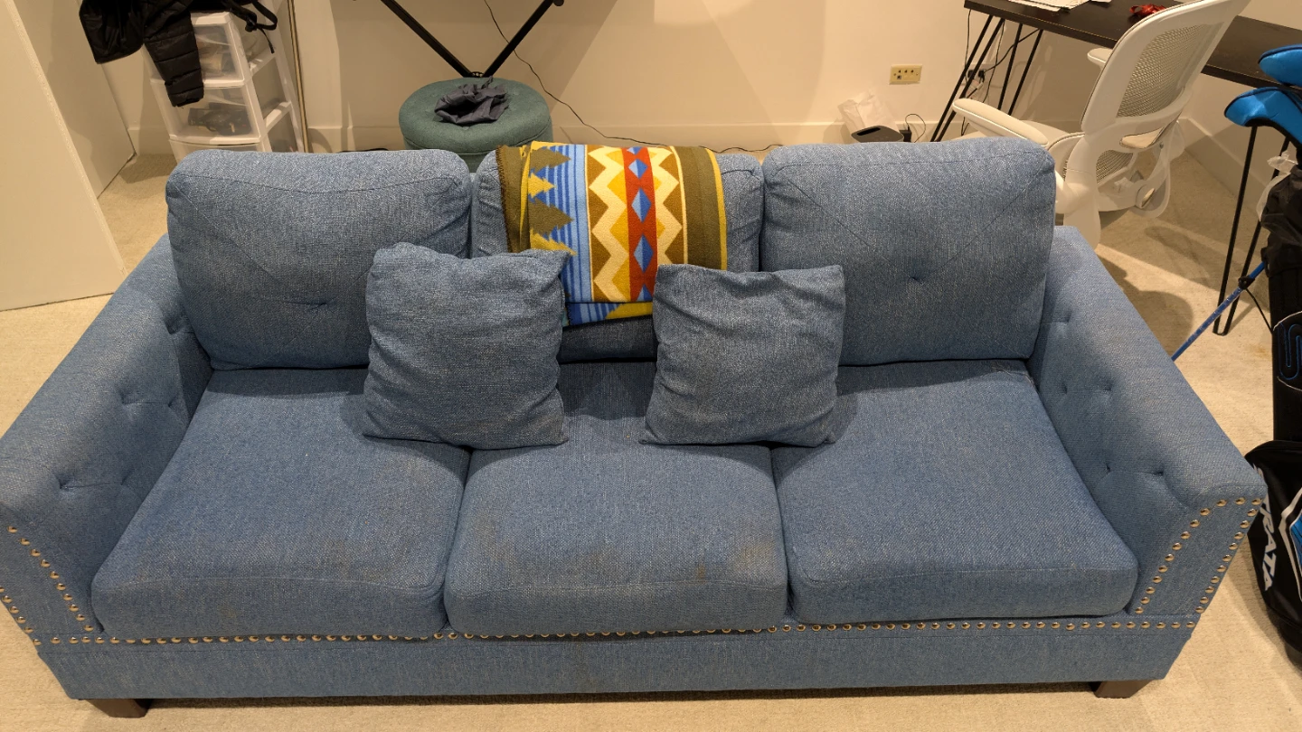 Blue Upholstered Sofa with Studded Details