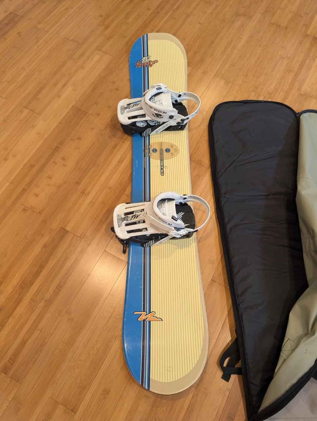 Forum Snowboard with Bindings and Bag