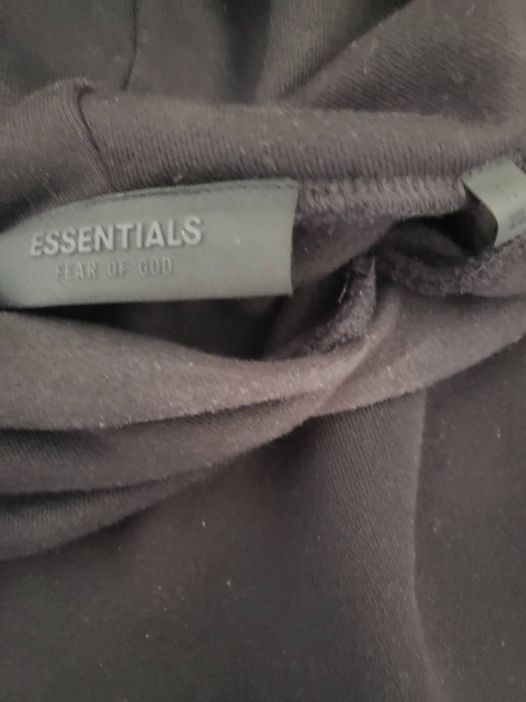 Fear of God Essentials Black Hoodie - photo 2