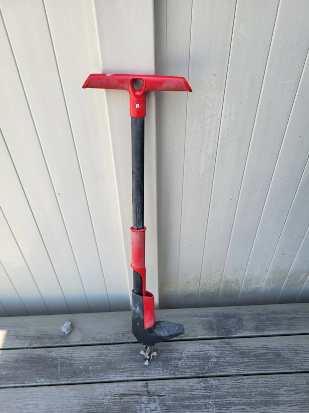 Red and Black Lawn Weeder Tool