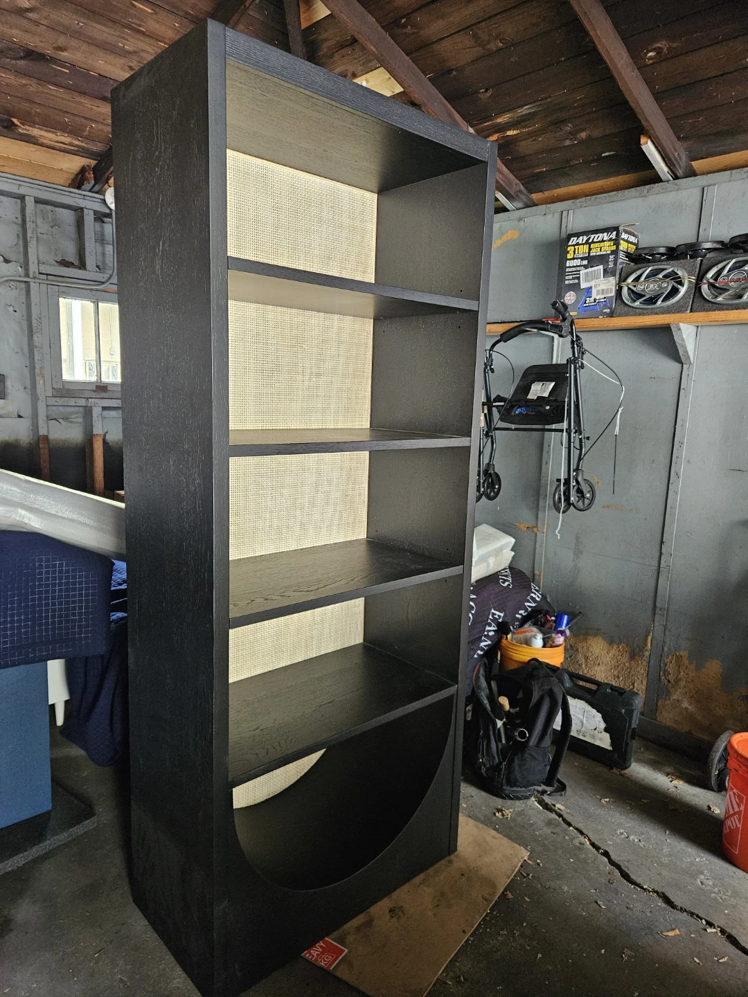 Black Wooden Bookshelf with Woven Backing