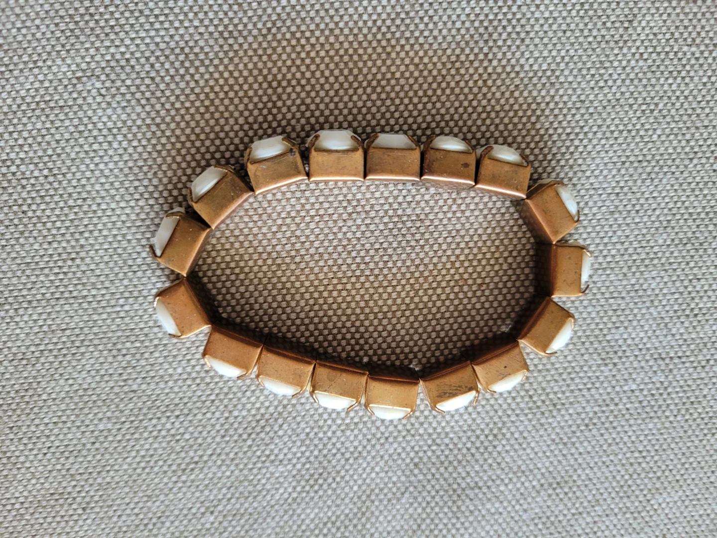 Stretch Bracelet with White Stones and Gold-Tone Setting