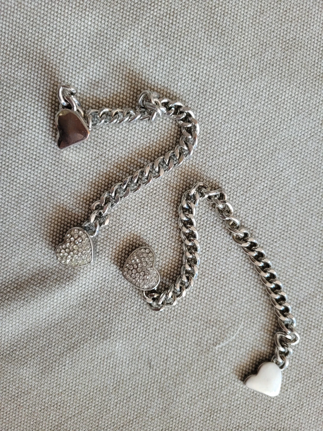 Silver friendship bracelet, $20 for both, or $10 each