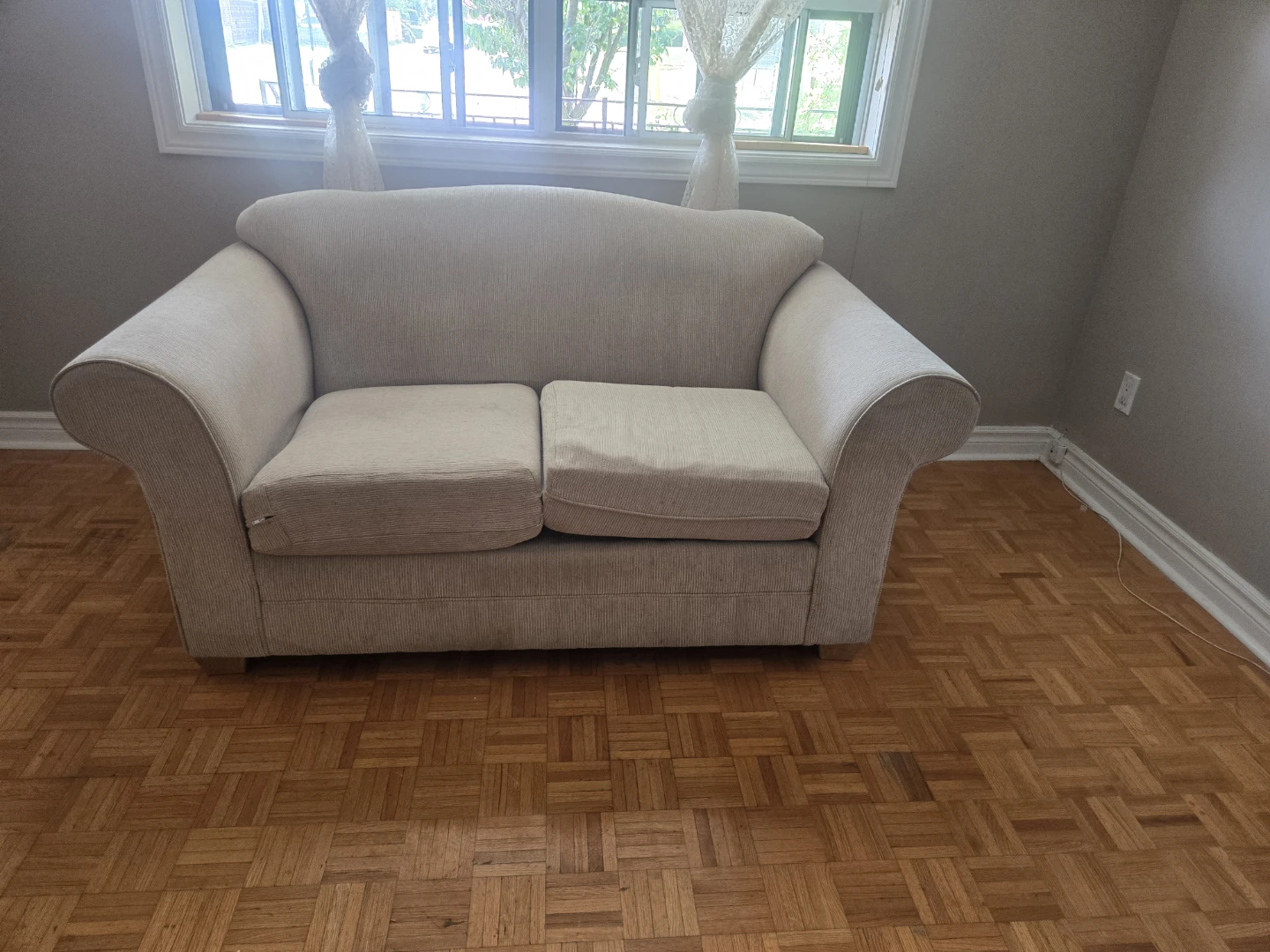 Loveseat Sofa - Beige Upholstery