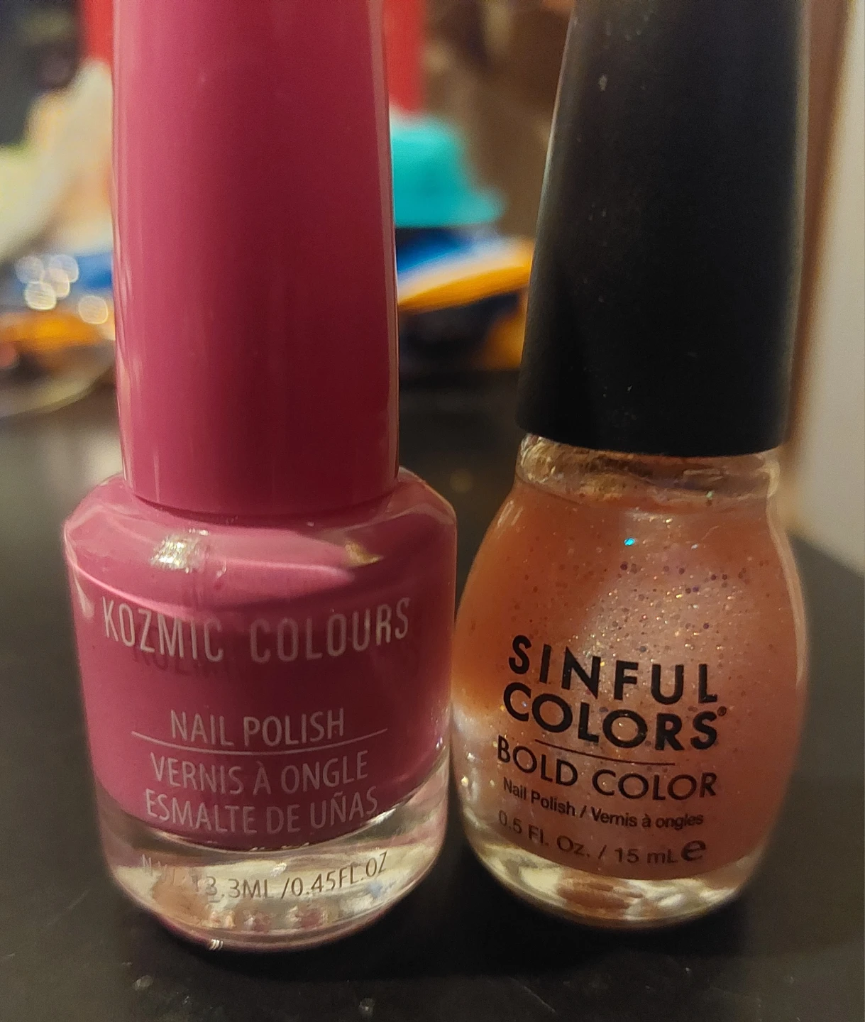 2 bottles of pink Nail Polish