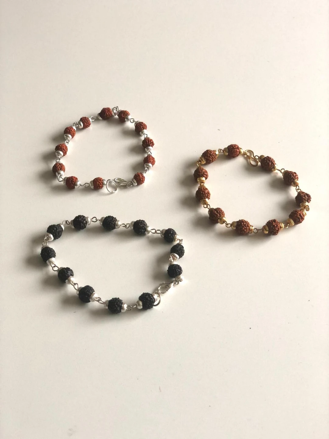 Three Bracelets: Rudraksha beads