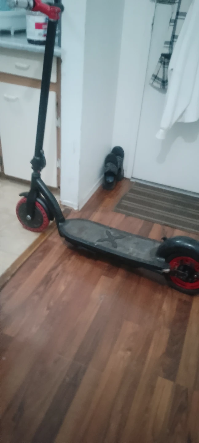 Black Electric Scooter with Red Accents not working project